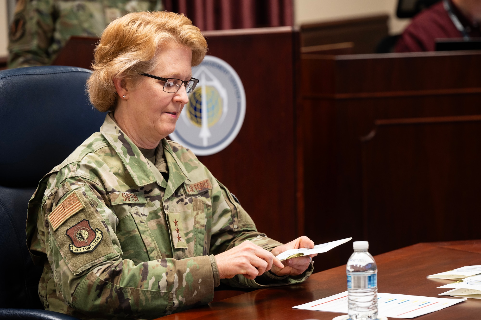 Lt. Gen. Donna Shipton, commander, Air Force Life Cycle Management Center, opens up an envelope to reveal one of the award winners during the AFLCMC Annual Awards Ceremony held at Wright-Patterson Air Force Base, Ohio, Feb. 27, 2025. The ceremony was held virtually so all of the Center’s various organizations located throughout the country could participate. (U.S. Air Force photo by Jim Varhegyi)