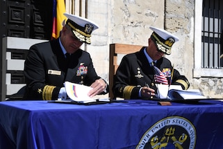 Rear Adm. Carlos Sardiello, Commander, U.S. Naval Forces Southern Command/U.S. 4th Fleet, left, and Ecuadorian Rear Adm. Luis Eduardo Piedra, General Inspector of the Ecuadorian Navy, right, sign the minutes of the U.S.-Ecuador Maritime Staff Talk at Castillo de San Marcos National Monument in St. Augustine, Fla., February 28, 2025. Maritime Staff Talks (MST) serve as an annual comprehensive engagement venue to program, direct, and coordinate all maritime activities between the U.S. and Partner Nations. The overarching MST objective is to increase coordination and integration across the U.S. maritime services and Partner Nations to plan and conduct theater-level security cooperation in order to provide combatant commanders more effective and efficient maritime force packages. U.S. Naval Forces Southern Command/U.S. 4th Fleet is the trusted maritime partner for Caribbean, Central and South America maritime forces leading to improved unity, security and stability. (U.S. Navy photo by Mass Communication Specialist First Class Steven Khor/Released)