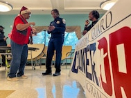 Members of the District of Columbia National Guard Drug Demand Reduction Outreach (DDRO) Civil Operators and the Metropolitan Police Department (MPD) coordinated with the Congress Heights Senior Wellness Center Dec. 16, 2024 in Washington, D.C. to discuss prevention and wellness tips during the holiday season in Ward 8.