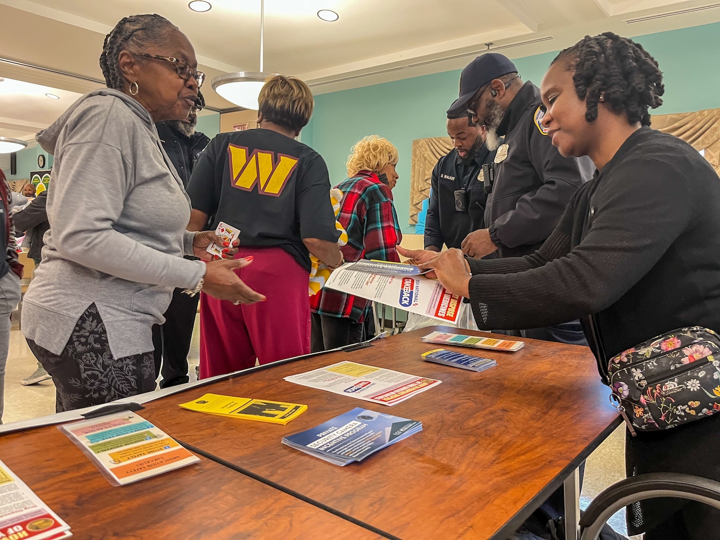 Members of the District of Columbia National Guard Drug Demand Reduction Outreach (DDRO) Civil Operators and the Metropolitan Police Department (MPD) coordinated with the Congress Heights Senior Wellness Center Dec. 16, 2024 in Washington, D.C. to discuss prevention and wellness tips during the holiday season in Ward 8.