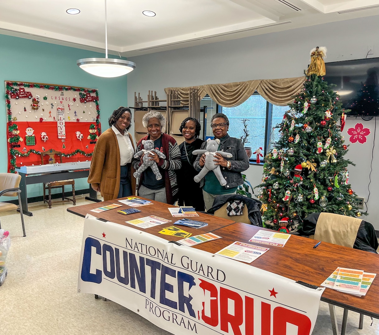 Members of the District of Columbia National Guard Drug Demand Reduction Outreach (DDRO) Civil Operators and the Metropolitan Police Department (MPD) coordinated with the Congress Heights Senior Wellness Center Dec. 16, 2024  in Washington D.C. to discuss prevention and wellness tips during the holiday season in Ward 8.