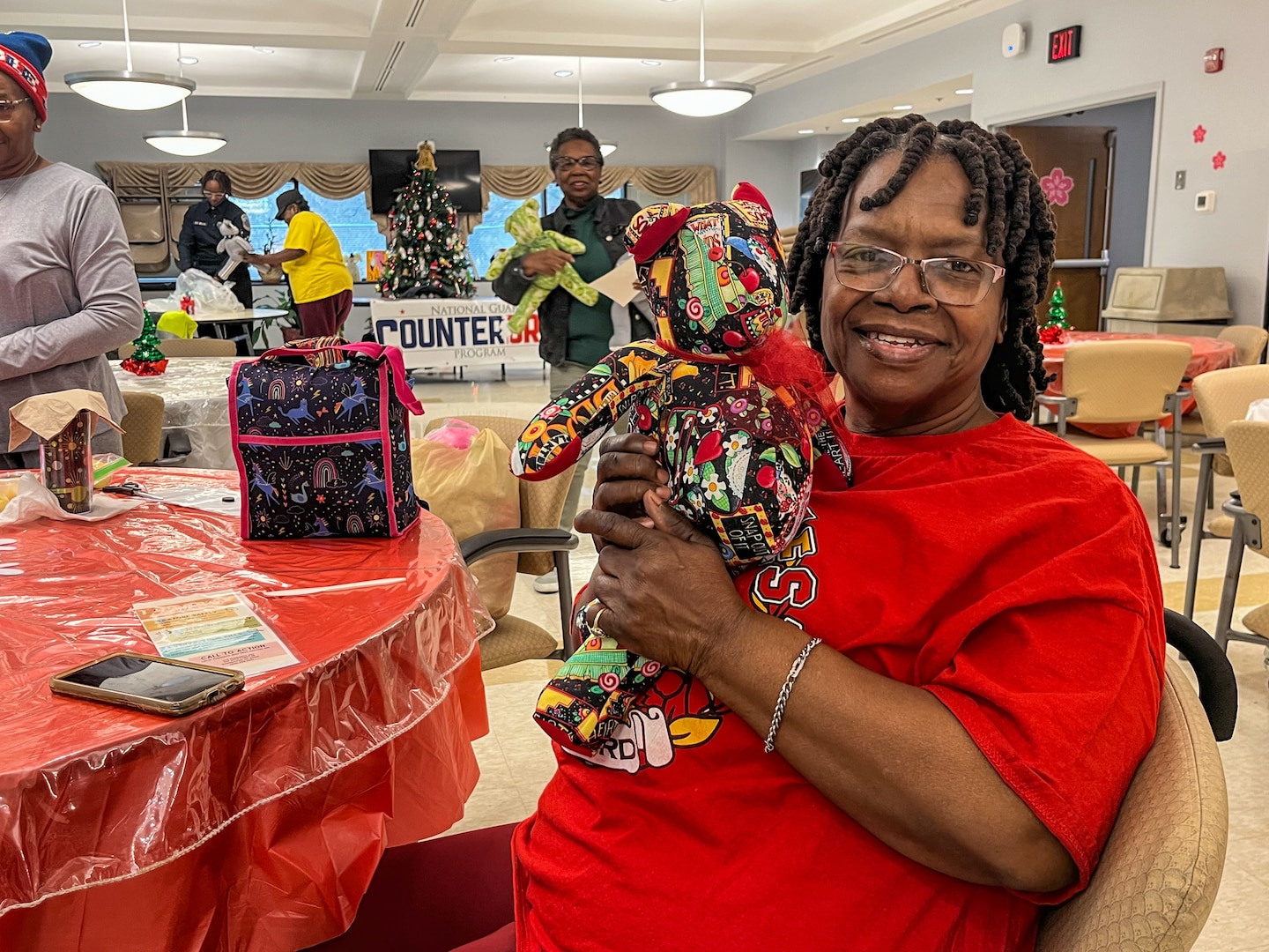 Members of the District of Columbia National Guard Drug Demand Reduction Outreach (DDRO) Civil Operators and the Metropolitan Police Department (MPD) coordinated with the Congress Heights Senior Wellness Center Dec. 16, 2024 in Washington D.C. to discuss prevention and wellness tips during the holiday season in Ward 8.