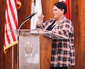 Gina Dickerson speaks during her retirement ceremony.