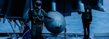 Lt. Rachel Lee, attached to Electronic Attack Squadron (VAQ) 140 as an electronic warfare officer, from Centerville, Virginia, performs preflight checks on an E/A-18G Growler on the flight deck of Nimitz-class aircraft carrier USS George Washington (CVN 73) in the Pacific Ocean, June 7, 2024.