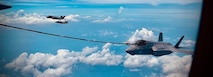 A U.S. Marine Corps F-35B Lighting II with Marine Fighter Attack Squadron (VMFA) 214, Marine Aircraft Group 13, 3rd Marine Aircraft Wing, receives fuel from a KC-130J Super Hercules with Marine Aerial Refueler Transport (VMGR) 352, MAG 11, 3rd MAW, for a littoral live-fire exercise off the coast of Zambales, Philippines, during Marine Aviation Support Activity 24, June 15, 2024.