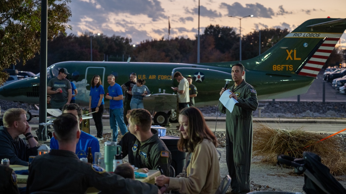 U.S. Air Force retired Col. James Muniz, 86th Flying Training Squadron (FTS) instructor pilot, speaks to Airmen at Laughlin Air Force Base, Texas, Dec. 16, 2024. During his speech, Muniz spoke about the legacy and history of the 86th FTS and the history of the T-1A Jayhawk. (U.S. Air Force photo by Staff Sgt. Nicholas Larsen)