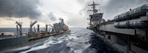 The Nimitz-class aircraft carrier USS Carl Vinson (CVN 70) conducts a fueling-at-sea with the Henry J. Kaiser-class fleet replenishment oiler USNS Henry J. Kaiser (T-AO 187), Dec. 14, 2024.