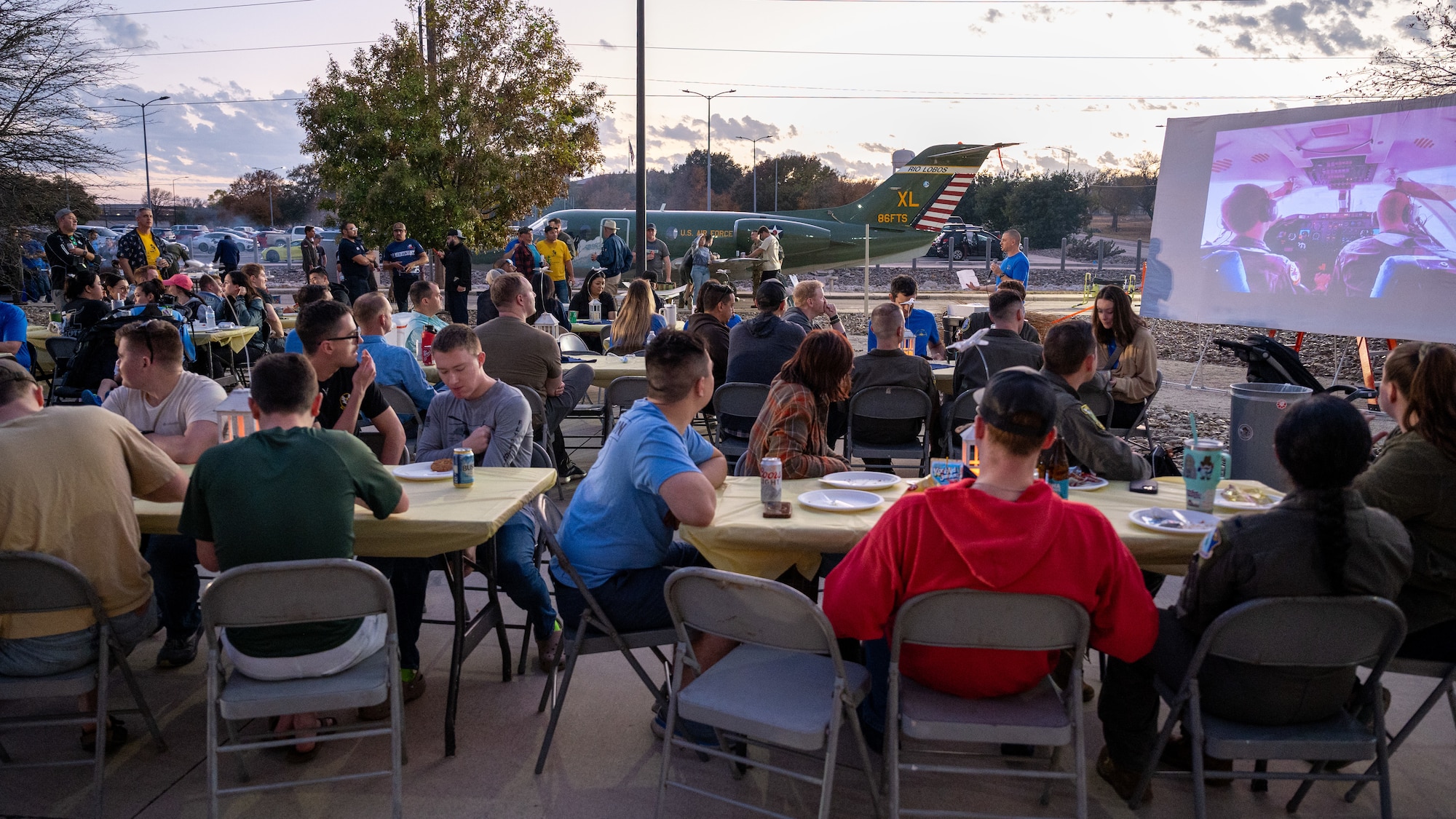 U.S. Air Force Lt. Col. Nathan Hedden, 86th Flying Training Squadron commander, speaks to Airmen at Laughlin Air Force Base, Texas, Dec. 16, 2024. Airmen of the 86th Flying Training Squadron held a barbecue and ceremony to celebrate the 31 years of service the T-1A Jayhawk had at Laughlin. (U.S. Air Force photo by Staff Sgt. Nicholas Larsen)