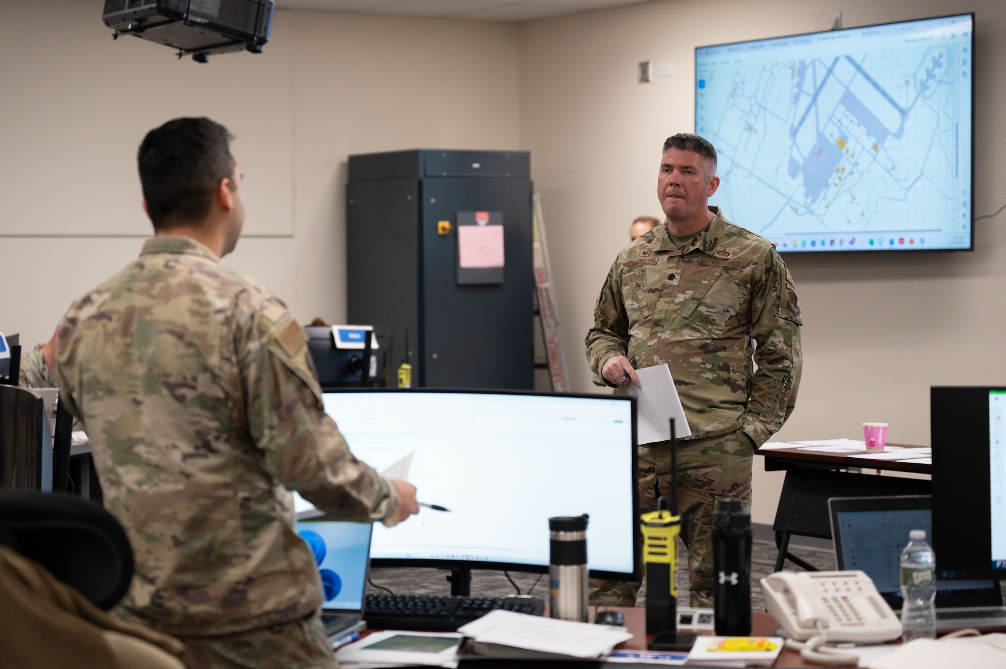 U.S. Air Force Lt. Col. Jeffery Andrieu, 102nd Civil Engineer Squadron commander, asks for updates from each member in the Emergency Operations Center during a natural disaster exercise on Otis Air National Guard Base, Massachusetts, Dec. 18, 2024.