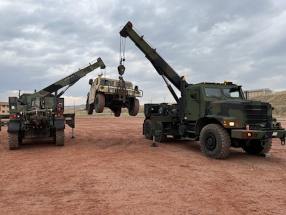U.S. Marines with Combat Logistics Regiment 4, 4th Marine Logistics Group, Marine Forces Reserve practice recovery techniques on vehicles during exercise Northern Strike 2024 in Grayling, Michigan, Mar. 29,  2024. NS 24 is a premier reserve component training event that focuses on joint readiness training to build interoperability and strengthen partnerships in an all-domain environment. (U.S. Marine Corps Photo by Master Sgt. Bryan Reza)