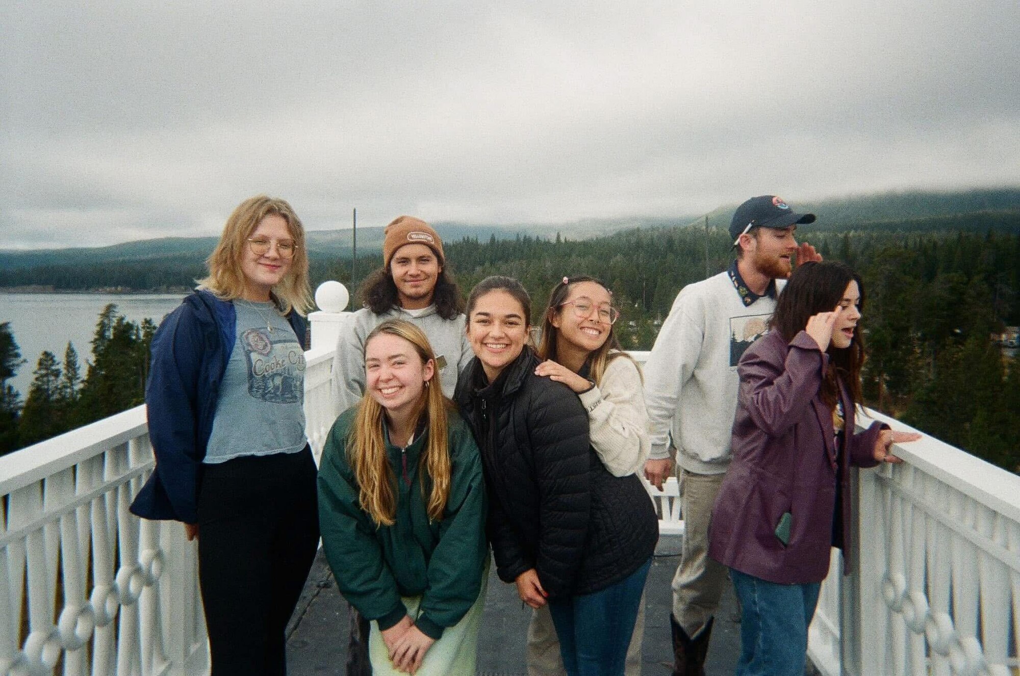 Lauren Torres (center), 97th Air Mobility Wing Public Affairs apprentice, poses for a photo with friends on the roof of the Lake Yellowstone Hotel at Yellowstone National Park, Wyoming. This photo was taken on her last day of working for the park. (courtesy photo)
