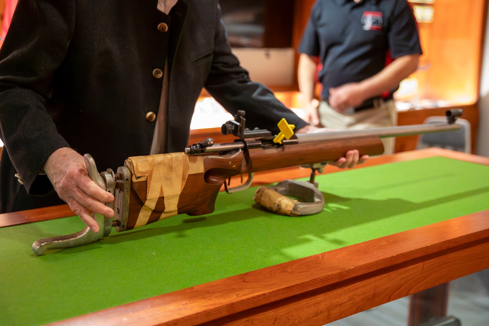 Gary Anderson, former Nebraska Guardsman, donates his 1964 Olympic gold medal winning rifle to the Nebraska National Guard Museum in Seward, Nebraska, Dec. 27, 2024. Anderson used the rifle to lead the U.S.A. marksmanship team to two 300-meter World Championship Gold Medals. He also used it to win a gold medal in the 1963 Pan American Games in the 300-Meter (3x40) free rifle event with a score of 1,146, just one point shy of the world record at the time.

It was the same rifle that Anderson used to win a Gold Medal at the 1964 Olympics in Tokyo on Oct. 15, 1964., the first of two consecutive Olympic Golds the Axtell, Nebraska, native earned in the 1960s while also serving as a Nebraska Army Guard engineering officer In Hastings and Grand Island.

(U.S. Army photo by Staff Sgt. Gauret Stearns)