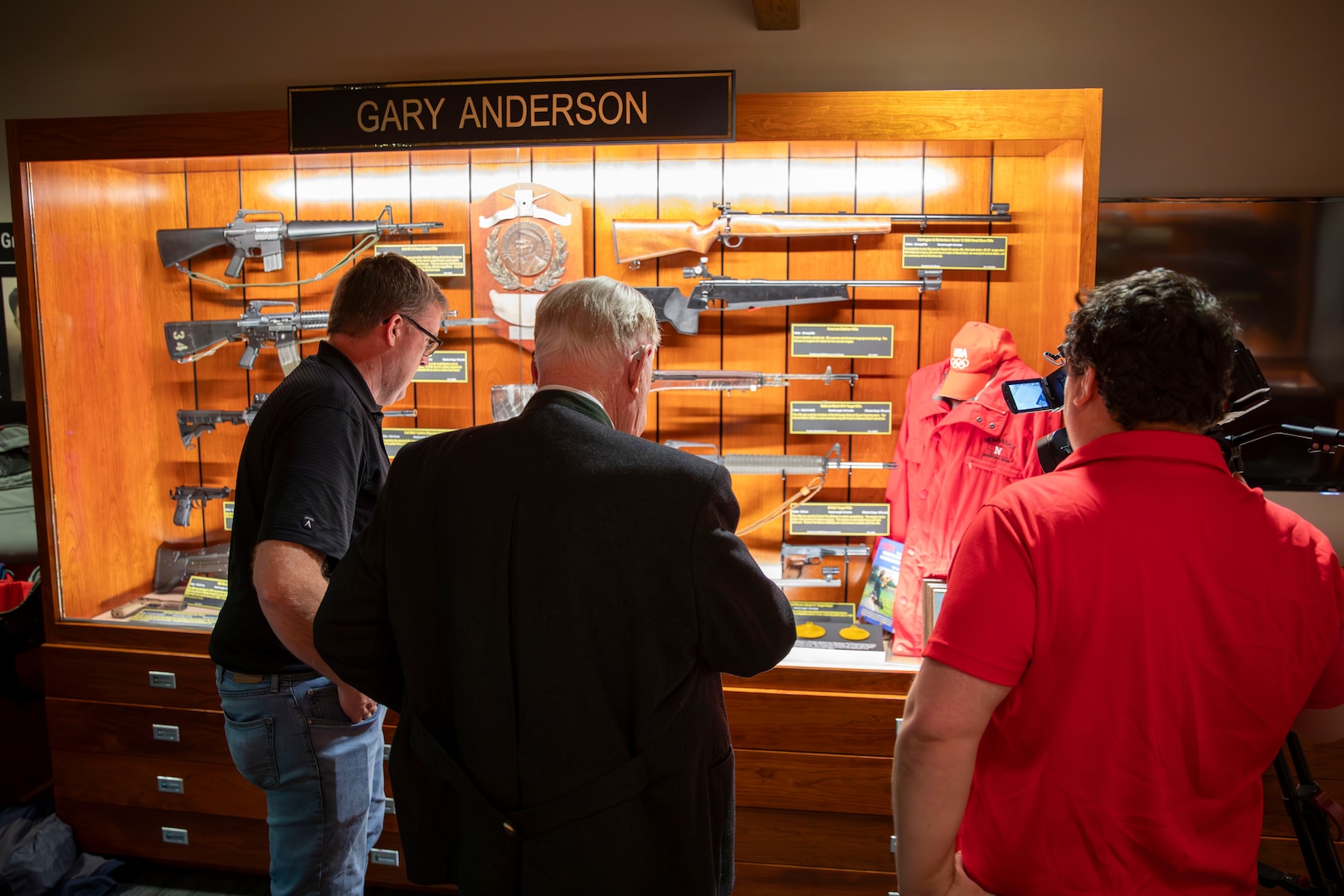 Gary Anderson, former Nebraska Guardsman, donates his 1964 Olympic gold medal winning rifle to the Nebraska National Guard Museum in Seward, Nebraska, Dec. 27, 2024. Anderson used the rifle to lead the U.S.A. marksmanship team to two 300-meter World Championship Gold Medals. He also used it to win a gold medal in the 1963 Pan American Games in the 300-Meter (3x40) free rifle event with a score of 1,146, just one point shy of the world record at the time.

It was the same rifle that Anderson used to win a Gold Medal at the 1964 Olympics in Tokyo on Oct. 15, 1964., the first of two consecutive Olympic Golds the Axtell, Nebraska, native earned in the 1960s while also serving as a Nebraska Army Guard engineering officer In Hastings and Grand Island.

(U.S. Army photo by Staff Sgt. Gauret Stearns)