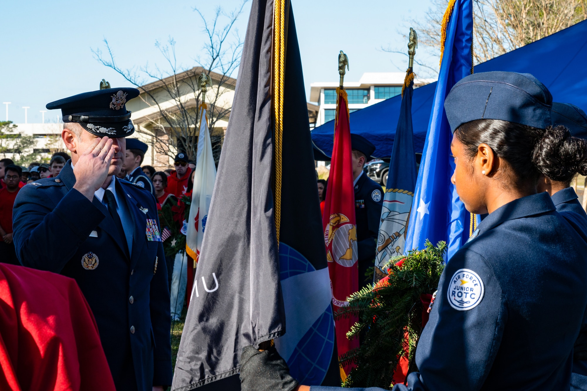 U.S. Air Force Col. Kaveri Crum, 1st Special Operations Wing deputy commander, salutes the U.S. Space Force flag during the Wreaths Across America Placement Ceremony at Beal Memorial Cemetery, Florida, Dec. 14, 2024.
