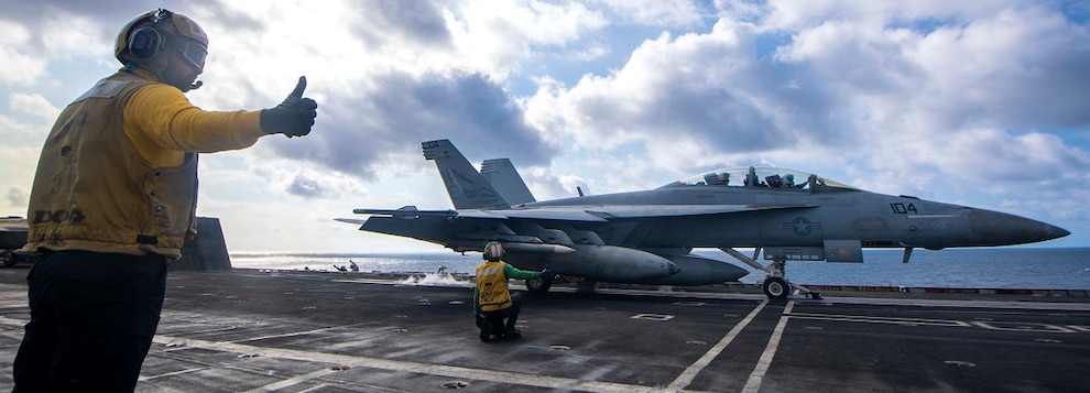 Sailors launch an F/A-18F Super Hornet assigned to the “Bounty Hunters” of Strike Fighter Squadron (VFA) 2 from the flight deck of the Nimitz-class aircraft carrier USS Carl Vinson (CVN 70), Jan. 3, 2025.