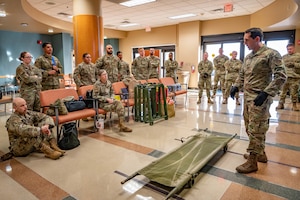For an emergency medical support request in response to the New Year’s Eve fireworks explosion in Hawaii, Reserve Citizen Airmen from the 944th Fighter Wing’s 944th Aeromedical Staging Squadron (ASTS) receive a briefing on patient movement techniques at the 56th Medical Group clinic at Luke Air Force Base, Ariz., Jan. 4, 2025. The briefing prepared the team for a joint operation to support critically injured patients from Hawaii, showcasing the unit’s readiness for real-world missions. The 944th ASTS, a unit known for its expertise in aeromedical evacuation, provided critical manpower for offloading the patients from the aircraft and transferring them to ambulances at the Phoenix Sky Harbor Airport. “Helping people who can’t help themselves – that’s why I joined,” explained Staff Sgt. Nathan Espinoza, 944th ASTS. “Seeing the resilience of these patients and knowing that our efforts are making a difference is incredibly rewarding.” (U.S. Air Force photo by Staff Sgt. Alexis Orozco)