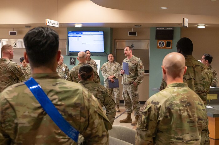 Reserve Citizen Airmen from the 944th Fighter Wing’s 944th Aeromedical Staging Squadron (ASTS) receive a mission briefing from Capt. Eric Huff, 56th Medical Group physician assistant, at Luke Air Force Base, Ariz., Jan. 4, 2025. The briefing prepared the team for a joint operation to support critically injured patients from Hawaii, showcasing the unit’s readiness for real-world missions. The 944th ASTS, a unit known for its expertise in aeromedical evacuation, provided critical manpower for offloading the patients from the aircraft and transferring them to ambulances at the Phoenix Sky Harbor Airport. “We had to transfer patients from military litters to Phoenix Fire Department gurneys, which required precise coordination,” Huff explained. “It’s not just about physical strength – it’s about communication and synchronization among all teams involved.” (U.S. Air Force photo by Staff Sgt. Alexis Orozco)