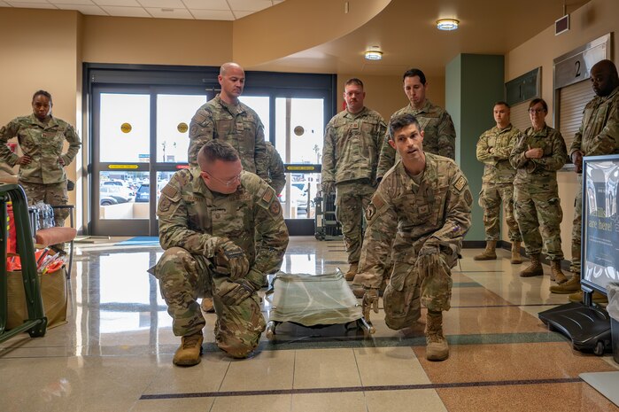 For an emergency medical support request in response to the New Year’s Eve fireworks explosion in Hawaii, Reserve Citizen Airmen of the 944th Fighter Wing’s 944th Aeromedical Staging Squadron (ASTS) practice litter-carry techniques during a joint training event at the 56th Medical Group clinic at Luke Air Force Base, Ariz., Jan. 4, 2025. The 944th ASTS, a unit known for its expertise in aeromedical evacuation, provided critical manpower for offloading the patients from the aircraft and transferring them to ambulances at the Phoenix Sky Harbor Airport. “This is why we train so rigorously,” said Master Sgt. Elisabeth Yates, 944th ASTS. “When you’re called at a moment’s notice, readiness is everything. This mission brought all our preparation into sharp focus.” (U.S. Air Force photo by Staff Sgt. Alexis Orozco)