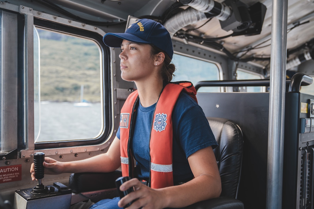 Coast Guard Petty Officer 3rd Class Kai Hall, a boatswains mate assigned to a Coast Guard Station Kauai, controls the 45-foot response boat while conducting a patrol around the island of Kauai, Hawaii, May 23, 2024. U.S. Coast Guard Station Kauai conducted an area of responsibility familiarization patrol around the island of Kauai, Hawaii. (U.S. Coast Guard photo by Petty Officer 2nd Class Tyler Robertson)