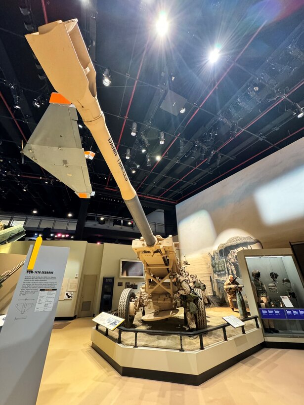 The restored M198 Howitzer, part of the battery that fired the first rounds into Kuwait during a series of artillery raids against Iraqi forces, stands in a display at the National Museum of the marine Corps as a powerful symbol of Marine Corps precision and firepower.