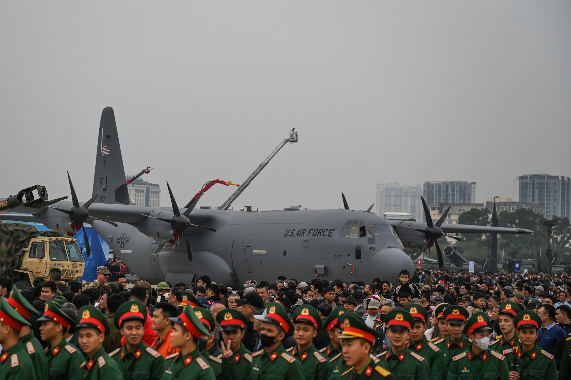 Members of the Vietnam People's Armed Forces and Vietnamese citizens attend the Vietnam Defense Expo 2024 at the Gia Lam Airport, Dec. 21, 2024. The U.S. is an Indo-Pacific nation and will remain engaged in the region, securing every opportunity to train alongside our Allies and partners to build interoperability and bolster our collective ability to support a free and open Indo-Pacific. (U.S. Air Force photo by Capt. Casey Bell)