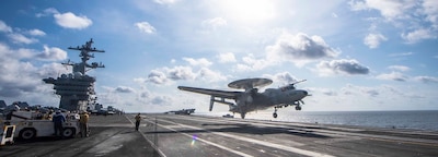 SOUTH CHINA SEA (Jan. 3, 2025) — An E-2D Advanced Hawkeye assigned to the “Black Eagles” of Carrier Airborne Early Warning Squadron (VAW) 113 launches from the flight deck of the Nimitz-class aircraft carrier USS Carl Vinson (CVN 70), Jan. 3, 2025. Vinson, the flagship of Carrier Strike Group ONE, is underway conducting routine operations in the U.S. 7th Fleet area of operations. (U.S. Navy photo by Mass Communication Specialist 3rd Class Nate Jordan)