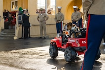 U.S. Marine Corps Lance Cpl. Bruno, the Marine Corps Recruit Depot San Diego and Western Recruiting Region mascot, arrives to the graduation ceremony of Fox Company, 2nd Recruit Training Battalion, MCRD San Diego, California, Dec. 20, 2024. This ceremony marked the end of a 13-week transformation process that included training in drill, marksmanship, basic combat skills, and Marine Corps customs and traditions. (U.S. Marine Corps photo by Lance Cpl. Eric Valerio)