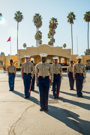U.S. Marine Corps staff and drill instructors with 2nd Recruit Training Battalion, stand in formation during graduation ceremony at MCRD San Diego, California, Dec. 20, 2024. This ceremony marked the end of a 13-week transformation process that included training in drill, marksmanship, basic combat skills, and Marine Corps customs and traditions. (U.S. Marine Corps photo by Lance Cpl. Eric Valerio)