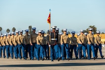 U.S. Marines with Fox Company, 2nd Recruit Training Battalion, march in formation during a graduation ceremony at Marine Corps Recruit Depot San Diego, California, Dec. 20, 2024. This ceremony marked the end of a 13-week transformation process that included training in drill, marksmanship, basic combat skills, and Marine Corps customs and traditions. (U.S. Marine Corps photo by Lance Cpl. Eric Valerio)