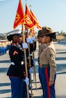 U.S. Marines with Fox Company, 2nd Recruit Training Battalion, exchange guidons during a graduation ceremony at Marine Corps Recruit Depot San Diego, California, Dec. 20, 2024. This ceremony marked the end of a 13-week transformation process that included training in drill, marksmanship, basic combat skills, and Marine Corps customs and traditions. (U.S. Marine Corps photo by Lance Cpl. Eric Valerio)