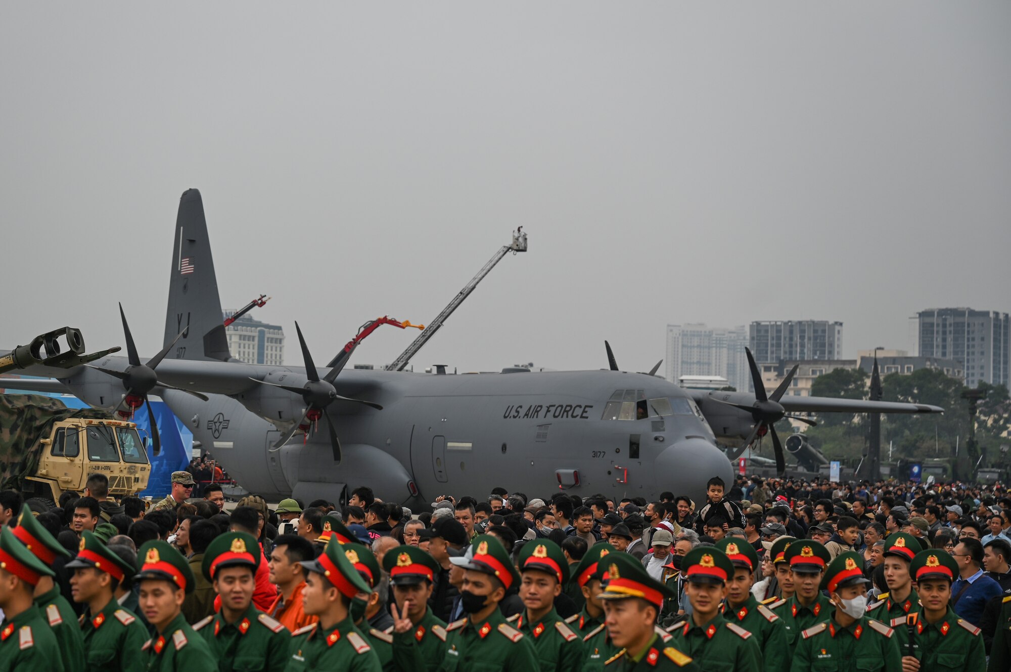 Members of the Vietnam People's Armed Forces and Vietnamese citizens attend the Vietnam Defense Expo 2024 at the Gia Lam Airport, Dec. 21, 2024. The U.S. is an Indo-Pacific nation and will remain engaged in the region, securing every opportunity to train alongside our Allies and partners to build interoperability and bolster our collective ability to support a free and open Indo-Pacific. (U.S. Air Force photo by Capt. Casey Bell)