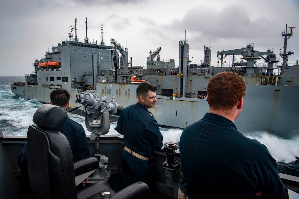 USS Sterett (DDG 104) breaks away from USNS Richard E. Byrd (T-AKE 4) after a replenishment in the South China Sea.