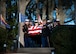 A team of services members from each branch of the armed forces is carrying the flag-draped casket of former President Jimmy Carter.