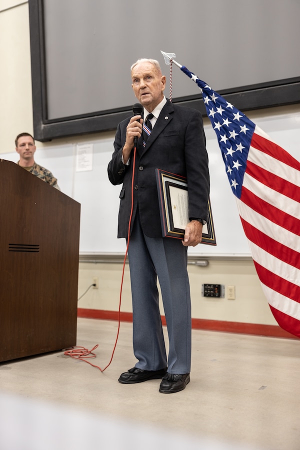 Retired U.S. Marine Corps Chief Warrant Officer 4 Gilbert H. Bolton, a Marine Gunner, gives remarks during an award ceremony at the School of Infantry-West, Marine Corps Base Camp Pendleton, California, Aug. 22, 2024. Bolton received a Presidential Lifetime Achievement Award for completing over 4,000 hours of service in his community.  Bolton retired on the first of October in 1991 after 32 years of honorable service. (U.S. Marine Corps photo by Lance Cpl. Mhecaela J. Watts)