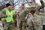 Maryland and Pennsylvania National Guard members arrive at the District of Columbia Armory to prepare for the electoral certification mission Jan. 5, 2024. The counting and certification of electoral votes was designated a National Special Security Event.