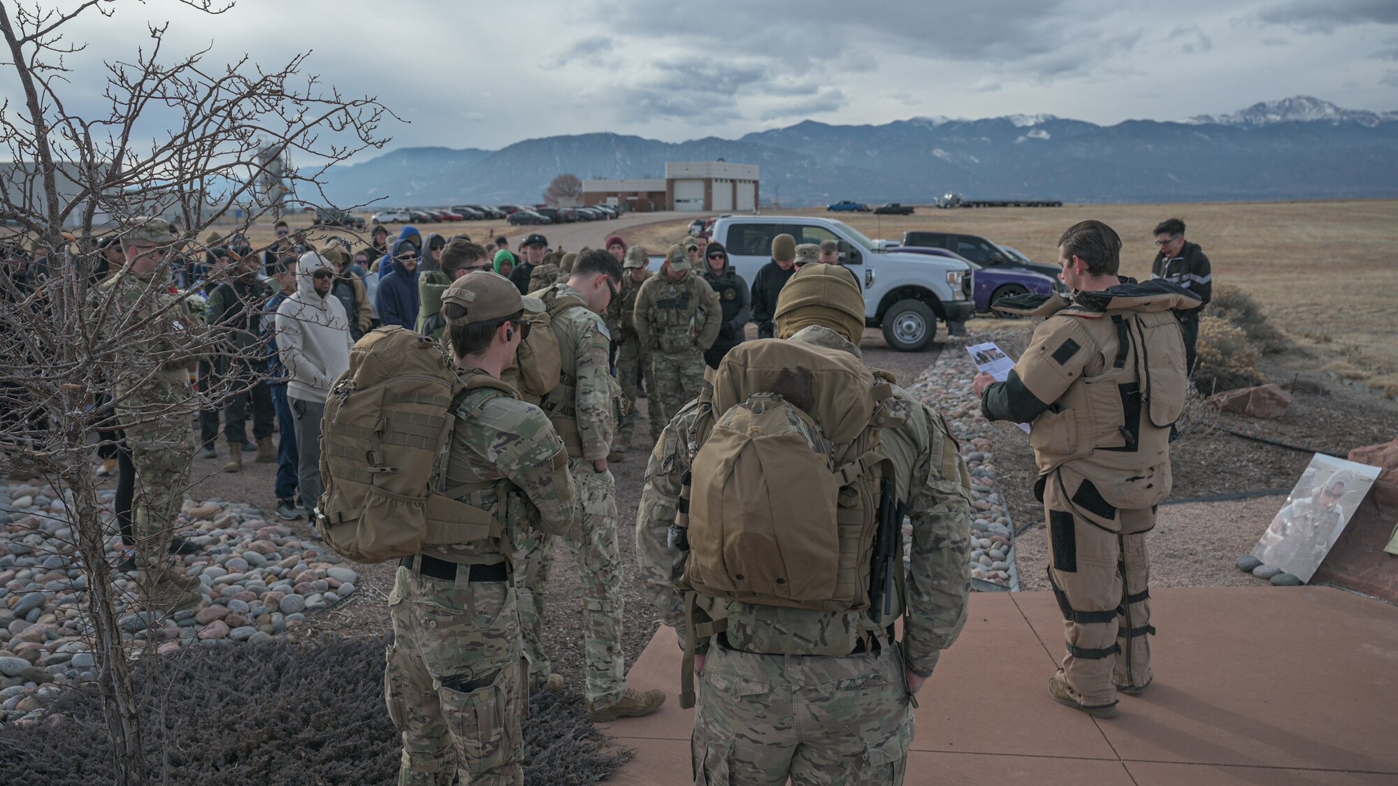 Airmen speaks in front of service members at the A1C Matthew Seidler Memorial.
