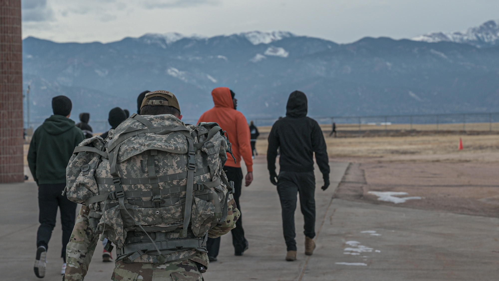 Airmen ruck on Peterson Space Force Base.