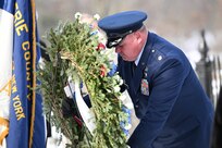 Lt. Col. William Gourlay, 107th Mission Support Group commander, New York Air National Guard, lays the presidential wreath on Millard Fillmore's grave, Jan. 7, 2025, in Buffalo, New York.