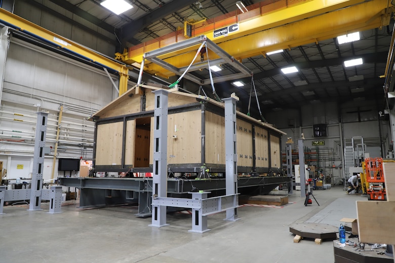 The 600-square-foot Cross Laminated Timber shelter on the Triaxial Earthquake and Shock Simulator at ERDC's Construction Engineering Research Laboratory (CERL)
