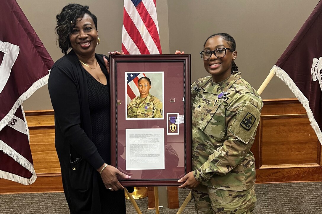 Sgt Aneska Holness and her mother after the Purple Heart Ceremony on  Fort Bliss, Dec 4, 2024.