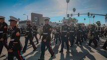 The U.S. Marine Corps' West Coast Composite Band marches in the 136th Rose Parade in Pasadena, California, Jan. 1, 2025. The Rose Parade, created to showcase the beauty of Pasadena, is part of an annual celebration, Tournament of Roses, that includes various floats, bands, dancers, and equestrian units. The Marine Corps has served the Nation honorably for 250 years. Marines embody the uncompromising standards and characteristics of honor, courage and commitment. (U.S. Marine Corps photo by Cpl. Alexandra M. Earl)