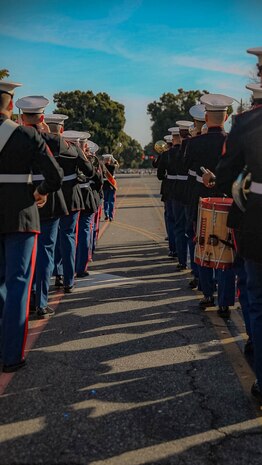The U.S. Marine Corps' West Coast Composite Band marches in the 136th Rose Parade in Pasadena, California, Jan. 1, 2025. The Rose Parade, created to showcase the beauty of Pasadena, is part of an annual celebration, Tournament of Roses, that includes various floats, bands, dancers and equestrian units. The Marine Corps has served the Nation honorably for 250 years. Marines embody the uncompromising standards and characteristics of honor, courage and commitment. (U.S. Marine Corps photo by Cpl. Alexandra M. Earl)