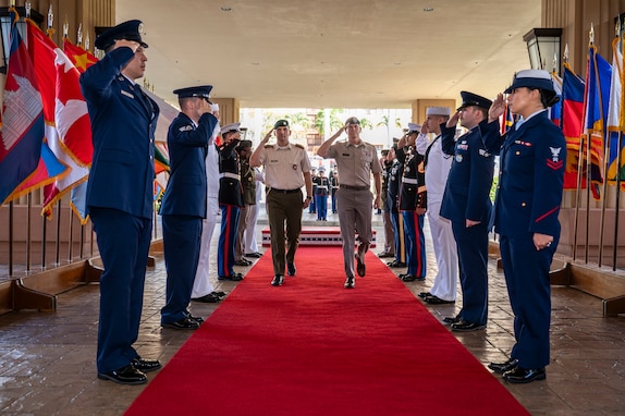 Lt. Gen. Joshua M. Rudd, deputy commander of U.S. Indo-Pacific Command, right, marches alongside Lithuanian Chief of Defence Gen. Raimundas Vaikšnoras during an honors ceremony at USINDOPACOM headquarters on Camp H.M. Smith in Hawaii, Jan. 7, 2025.