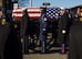 Service members in state funeral procession.