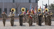 U.S. Army Soldiers assigned to the Eighth Army Band conduct pass and review during the Eighth Army Change of Command Ceremony for Lt. Gen. Willard M. Burleson lll, (outgoing commander) and Lt. Gen. Christopher C. LaNeve, (incoming commander), at Camp Humphreys in South Korea, April 5, 2024.