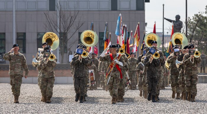 U.S. Army Soldiers assigned to the Eighth Army Band conduct pass and review during the Eighth Army Change of Command Ceremony for Lt. Gen. Willard M. Burleson lll, (outgoing commander) and Lt. Gen. Christopher C. LaNeve, (incoming commander), at Camp Humphreys in South Korea, April 5, 2024.