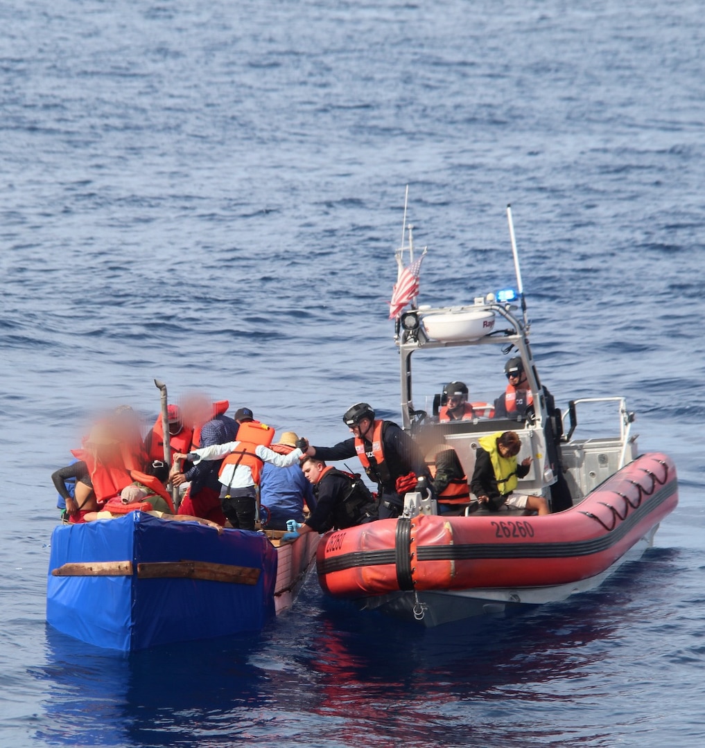 Coast Guard Cutter Robert Yered's law enforcement small boat crew interdicts a migrant vessel, 36 miles south of Key West, Florida, Dec. 30, 2024. The crew of Coast Guard Cutter William Flores repatriated all aboard the rustic vessel back to Cuba, Jan. 9, 2025. (U.S. Coast Guard courtesy photo)