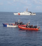 Law enforcement small boat crews from Coast Guard Cutters Robert Yered and Kathleen Moore interdict a migrant vessel, 36 miles south of Key West, Florida, Dec. 30, 2024. The crew of Coast Guard Cutter William Flores repatriated all aboard the rustic vessel back to Cuba, Jan. 9, 2025. (U.S. Coast Guard courtesy photo)