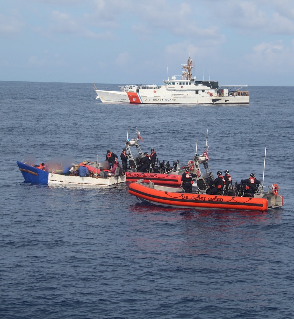 Law enforcement small boat crews from Coast Guard Cutters Robert Yered and Kathleen Moore interdict a migrant vessel, 36 miles south of Key West, Florida, Dec. 30, 2024. The crew of Coast Guard Cutter William Flores repatriated all aboard the rustic vessel back to Cuba, Jan. 9, 2025. (U.S. Coast Guard courtesy photo)