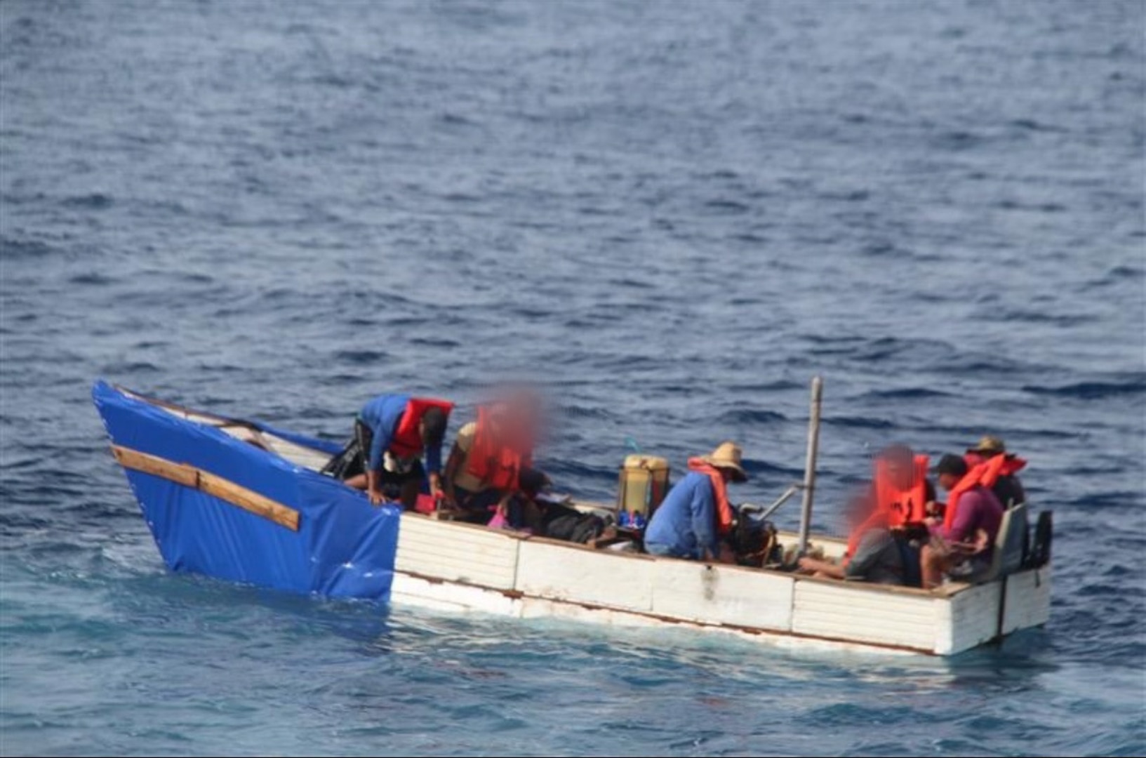 Coast Guard Cutter Robert Yered's law enforcement small boat crew interdicts a migrant vessel, 36 miles south of Key West, Florida, Dec. 30, 2024. The crew of Coast Guard Cutter William Flores repatriated all aboard the rustic vessel back to Cuba, Jan. 9, 2025. (U.S. Coast Guard courtesy photo)